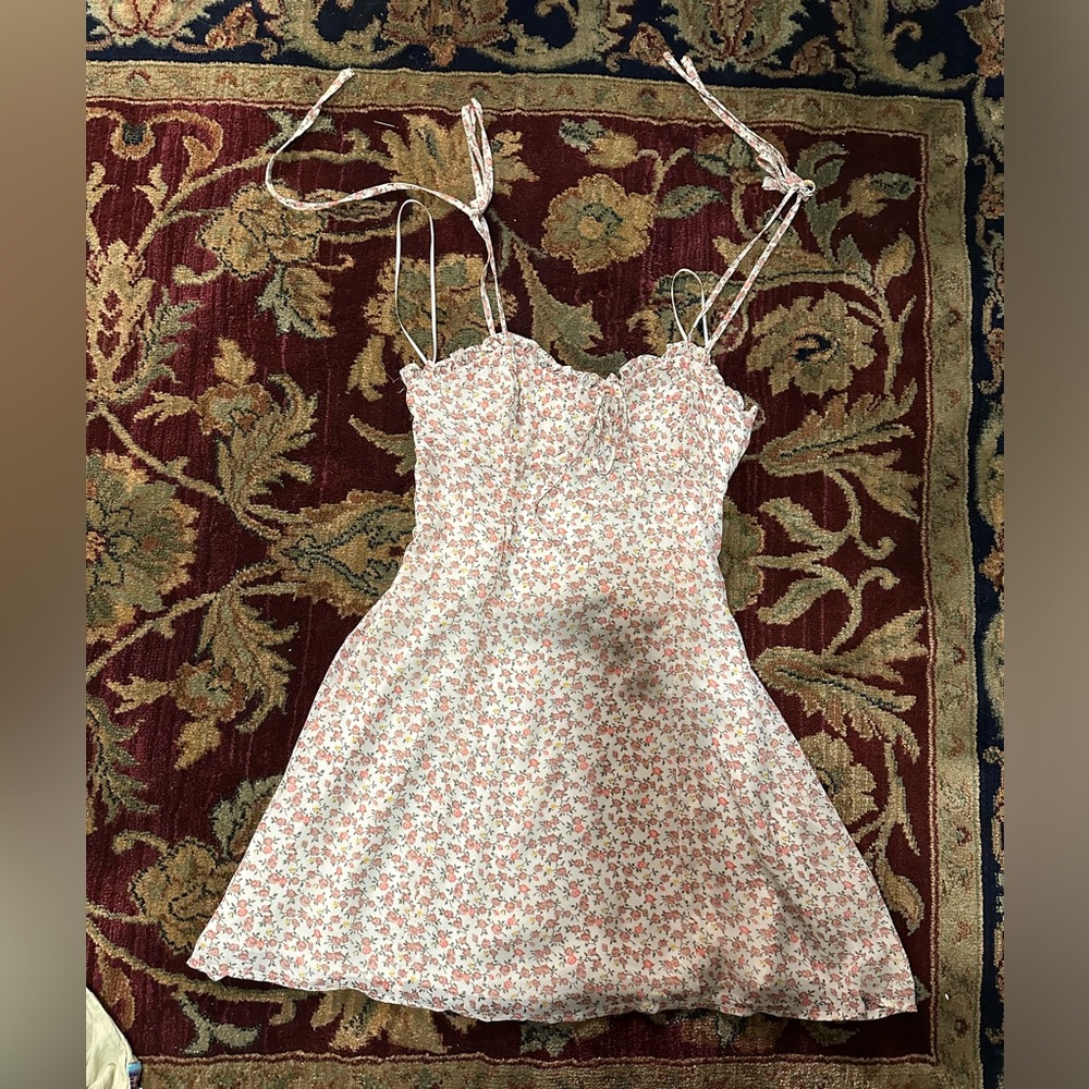 A floral mini dress with tie straps.